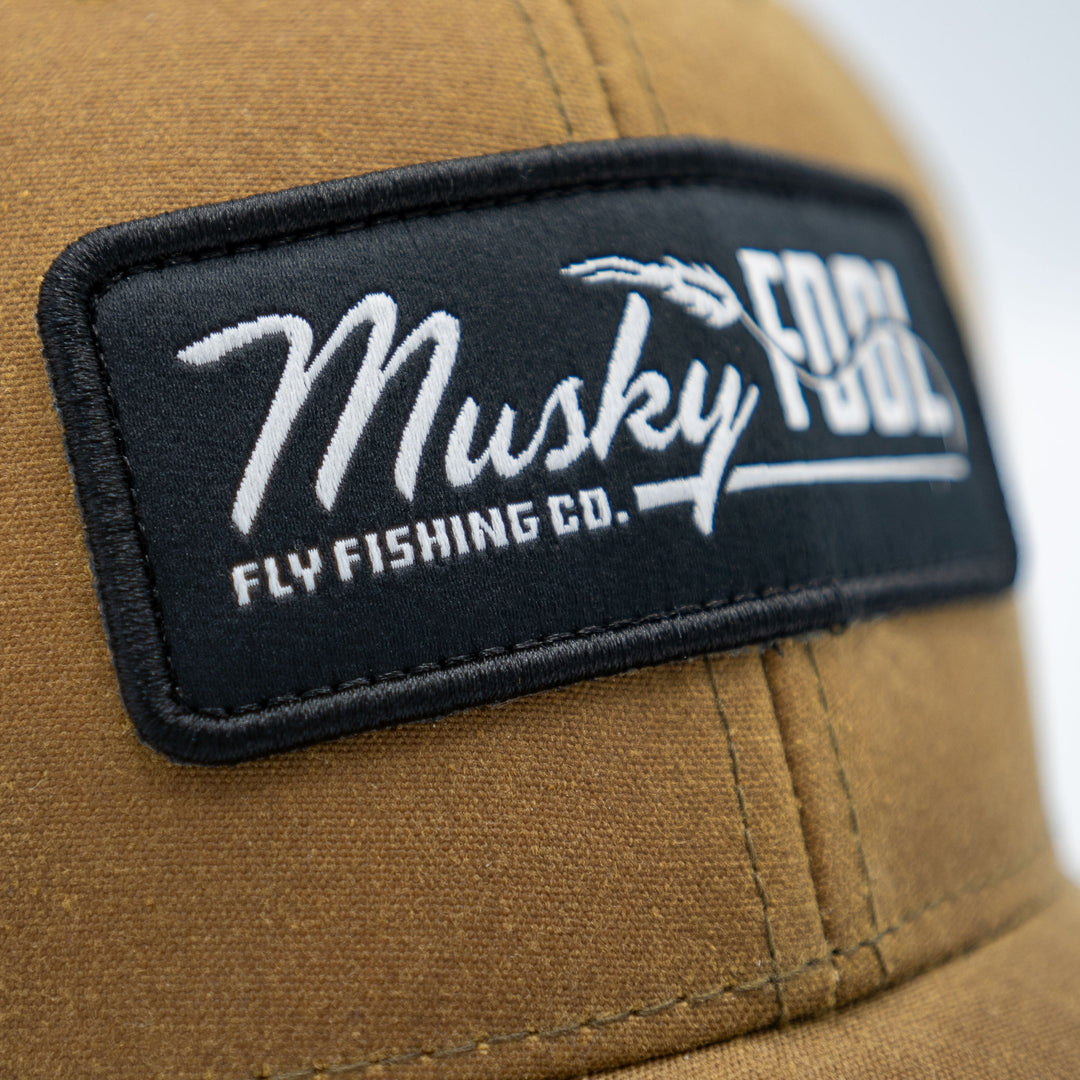 Musky Fool™ Classic Waxed Trucker Hat