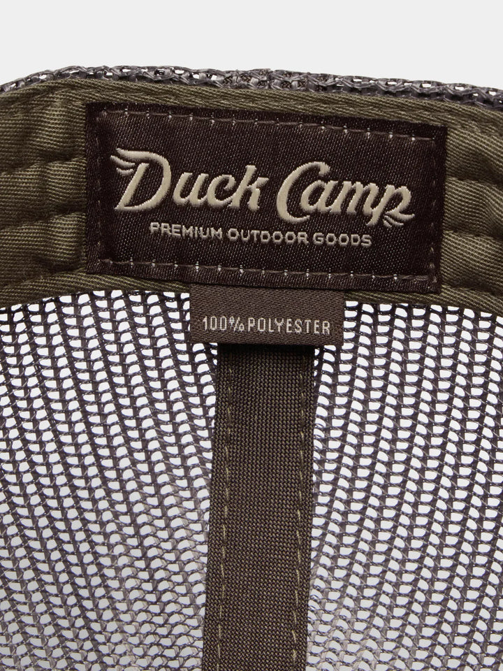 Duck Camp Trucker Hat in Woodland Camo